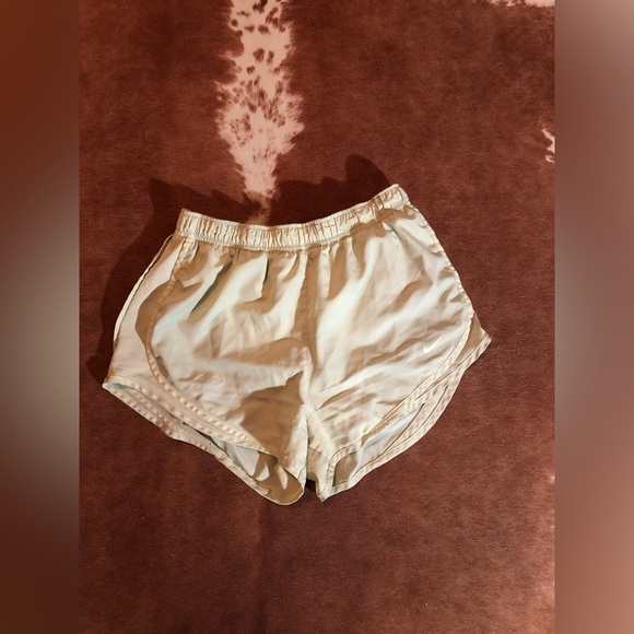 Nike running shorts 
size medium 
Light green! - Picture 1 of 4
